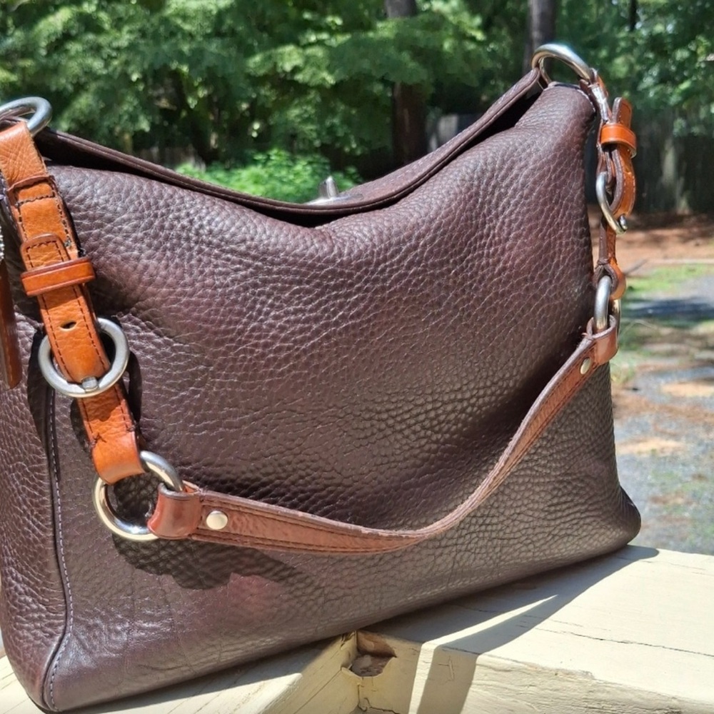 Elegant Brown Coach Shoulder Bag w lavender interior.